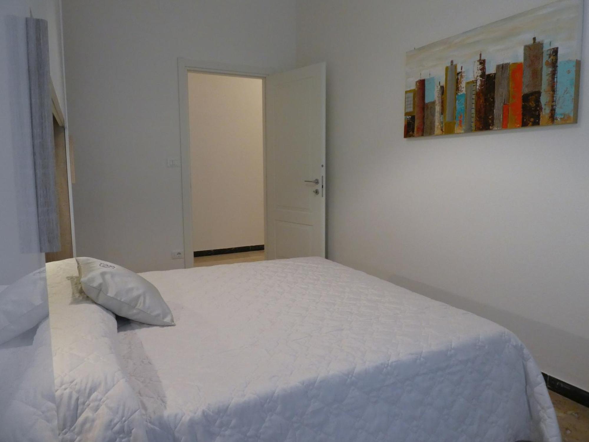 Isola Di Man Apartment Империа Екстериор снимка